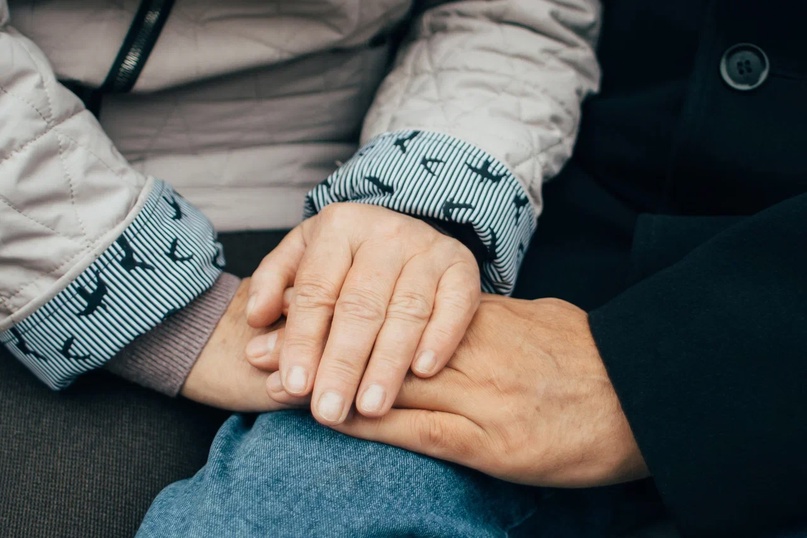 Vadim Viktorovich holding hands with his wife